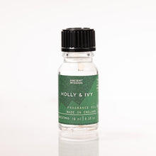 Load image into Gallery viewer, Bottle of Holly & Ivy fragrance oil with a green label on a white background