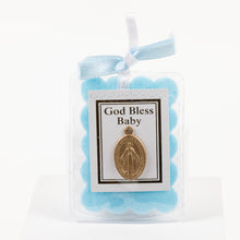 Load image into Gallery viewer, A miraculous medal encased in plastic with a blue bow and cloth and a gold trim. The blessing reads "God Bless Baby". 
