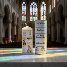 Load image into Gallery viewer, A Baptismal Candle with a decorative keepsake tube. The candle is white with gold and soft pastel illustrations.
