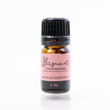Load image into Gallery viewer, Bottle of Bergamot essential oil with a pink label on a white background
