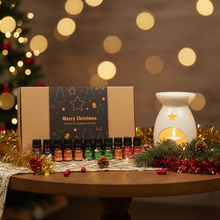 Load image into Gallery viewer, Set of Christmas fragrance oils with a decorative box on a white background
