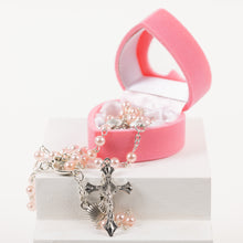 Load image into Gallery viewer, Pink rosary with silver cross in an open heart shaped pink box on a white background
